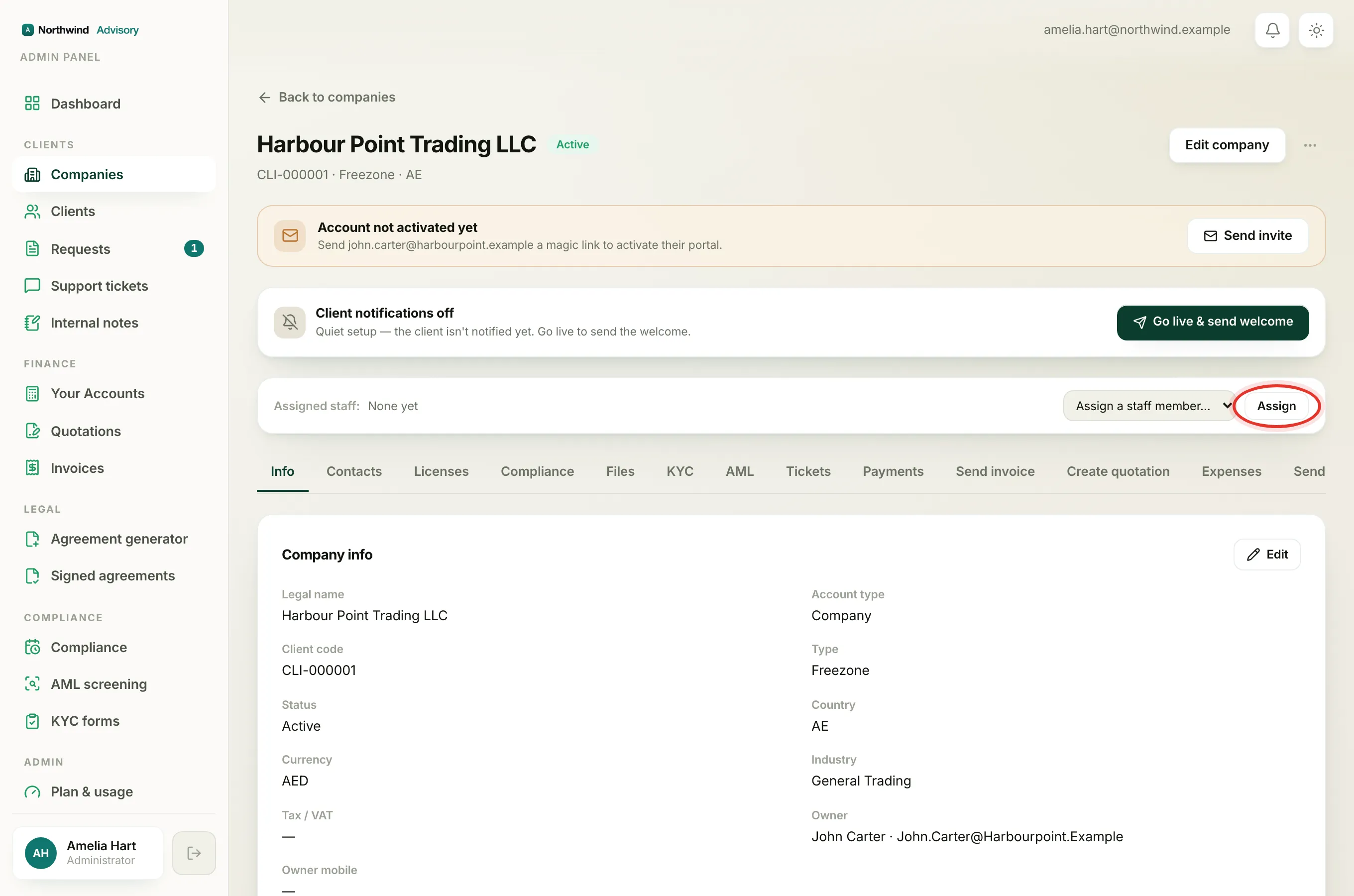 The Assigned staff bar on a company page with the dropdown to pick a teammate.